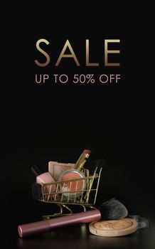 Cosmetic sale flyer. Special offer, up to 50 percent discount. Black friday concept. Sale and deal. Shopping trolley full of make up and cosmetic goods on black background. Goods for women. Closeup of a basket with products for make-up.