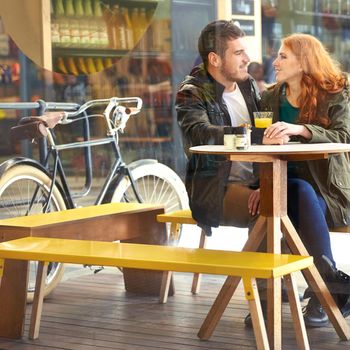 Its one of those perfect dates. a happy young couple on a date at a cafe