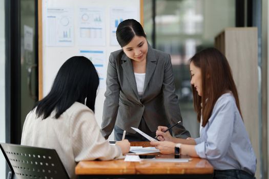 Financial Analyst discussing with Investment Banker at Meeting Room. Fund investment concept.