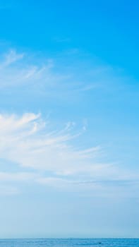 BANNER, VERTICAL STORY Atmosphere panorama white cloud clear blue sky horizon line calm empty sea. Concept paradise life. Design relax wallpaper background. More tone format in stock.
