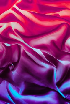 Fabric texture, abstract backdrop and modern luxury design concept - Colourful artistic silk waves, holiday background