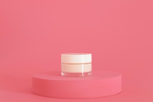 Cosmetic cream packaging standing on pink podium. Cream presentation on the pink background. Mockup