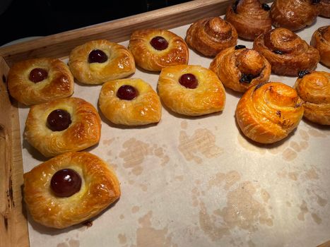 freshly baked danish pastry with apricot jam fruity jelly super delicious warm fresh buttery baked pastries with apricot and peach in bakery kitchen