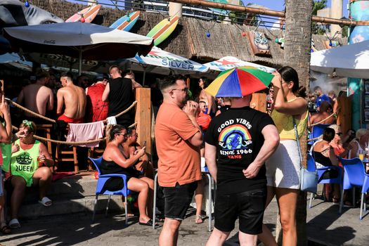 Benidorm, Alicante, Spain- September 10, 2022: Pub full of British tourists drinking alcohol in Benidorm, Spain