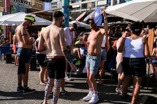 Benidorm, Alicante, Spain- September 10, 2022: Pub full of British tourists drinking alcohol in Benidorm, Spain