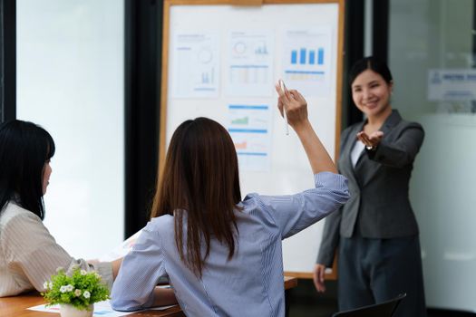 Financial Analyst discussing with Investment Banker at Meeting Room. Fund investment concept.