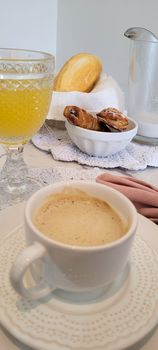 breakfast table with coffee and food