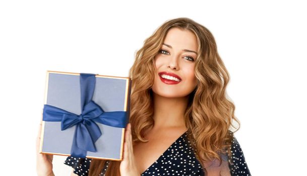 Birthday, Christmas or holiday present, happy woman holding a blue gift or luxury beauty box subscription delivery isolated on white background, portrait