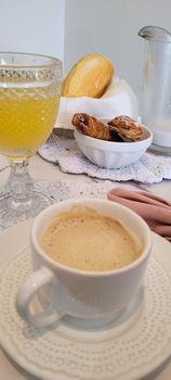 breakfast table with coffee and food