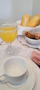 breakfast table with coffee and food