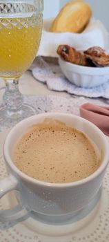 breakfast table with coffee and food