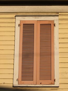 Window with closed shutters on Key West, Florida.