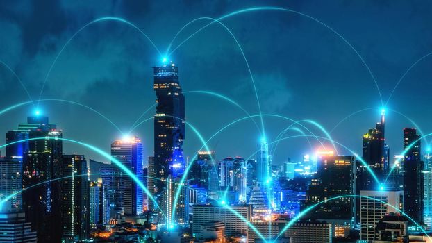 Smart digital city with connection network reciprocity over the cityscape . Concept of future smart wireless digital city and social media networking systems that connects people within the city .