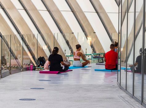Group of young people practicing yoga