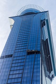 Dubai, UAE - 09.24.2021 External glass cleaning of The View at The Palm.