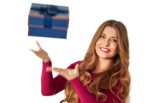 Birthday, Christmas or holiday present, happy woman holding a blue gift or luxury beauty box subscription delivery isolated on white background, portrait