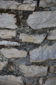 Twenty years old wall with stones in abandoned Kastri greek village retro background high quality big size prints