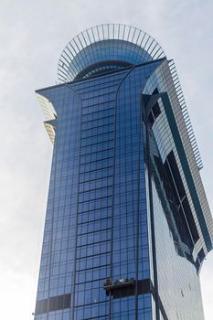 Dubai, UAE - 09.24.2021 External glass cleaning of The View at The Palm.
