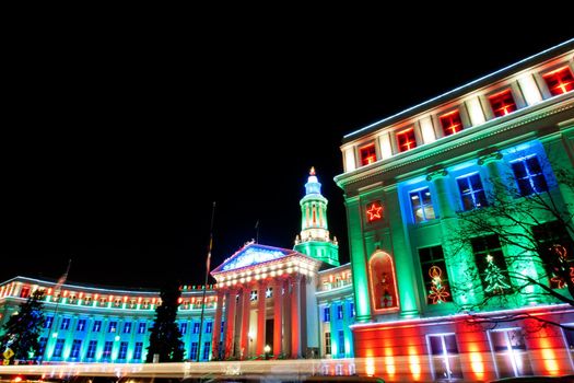 Downtown Denver at Christmas. Denver's City and County building decorated with holiday lights.