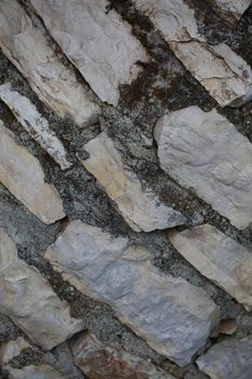 Twenty years old wall with stones in abandoned Kastri greek village retro background high quality big size prints