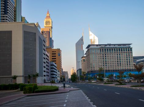 Dubai Financial Center road. Landmarks such Jumeirah Emirates towers, Ritz Carlton, DIFC on the picture. Outdoors