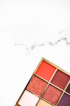 Cosmetic branding, fashion blog and glamour set concept - Eye shadow palette swatches on marble background, make-up and eyeshadows cosmetics product for luxury beauty brand and holiday flatlay design