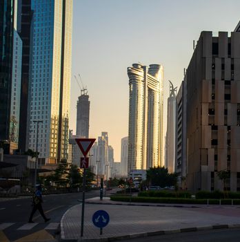 Dubai Financial Center road. Address Sky view hotel can be seen on the scene. Outdoors