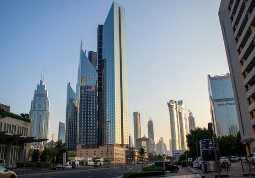 Dubai Financial Center road. Address Sky view hotel, Dusit Thani hotel and Burj Khalifa tallest building in the world can be seen on the scene. Outdoors