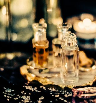 Perfumery, cosmetic branding and spa concept - Perfume bottles and vintage fragrance at night, aroma scent, fragrant cosmetics and eau de toilette as luxury beauty brand, holiday fashion parfum design