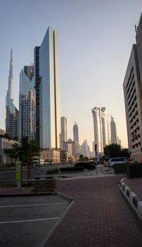 Dubai Financial Center road. Address Sky view hotel and Burj Khalifa tallest building in the world can be seen on the scene. Outdoors