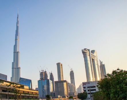 Dubai Financial Center road. Address Sky view hotel and Burj Khalifa tallest building in the world can be seen on the scene. Outdoors