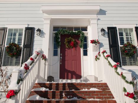 House decorated for winter holidays.