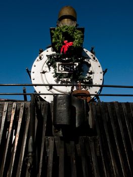 Rio Grande Western 683 locomotive is decorated for Christmas. This is the oldest operating locomotive in Colorado built by Baldwin in 1881.