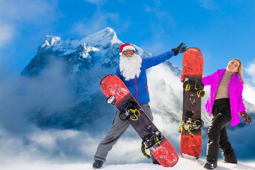 family and snowboard on snowy mountain.