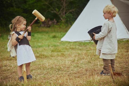 Hojbjerg, Denmark, August, 2022: Children playing at the viking festival