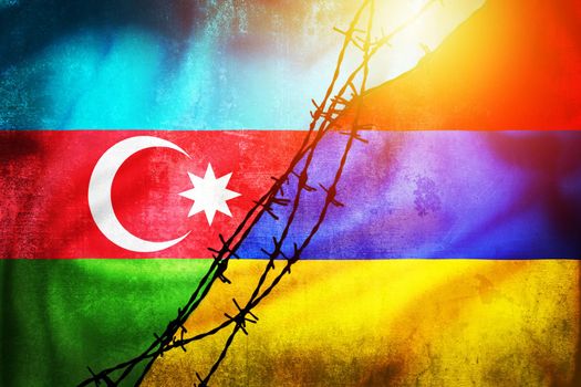 Grunge flags of Azerbaijan and Armenia divided by barb wire illustration sun haze view, concept of tense relations between two countries