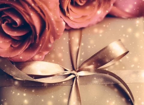 Vintage design, shop sale promotion and happy surprise concept - Luxury holiday golden gift box and bouquet of roses as Christmas, Valentines Day or birthday present