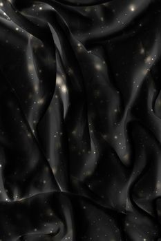 Winter fashion, shiny fabric and night party style concept - Magic holiday black silk flatlay background texture with golden shine, luxury glamour abstract backdrop