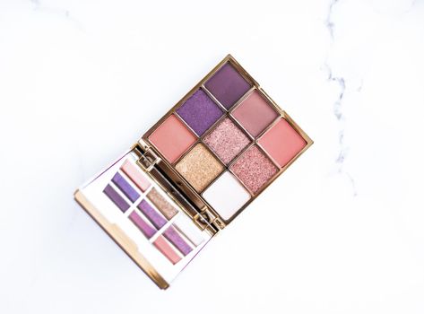 Cosmetic branding, fashion blog and glamour set concept - Eye shadow palette swatches on marble background, make-up and eyeshadows cosmetics product for luxury beauty brand and holiday flatlay design