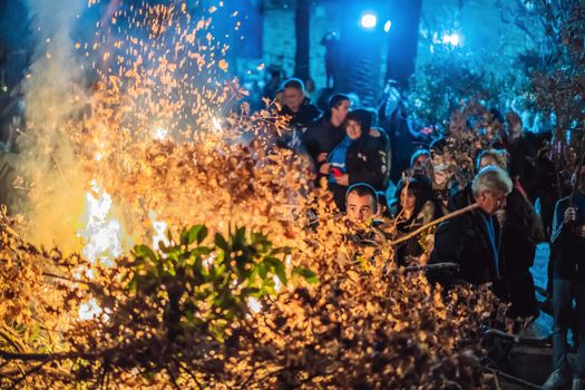 Montenegro, Budva 7.01. 2021: Christian Christmas in Montenegro, the feast of the oak branch. People burn an oak branch in honor of Christmas.