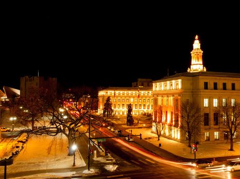 Downtown Denver at Christmas. Denver's City and County building decorated with holiday lights.