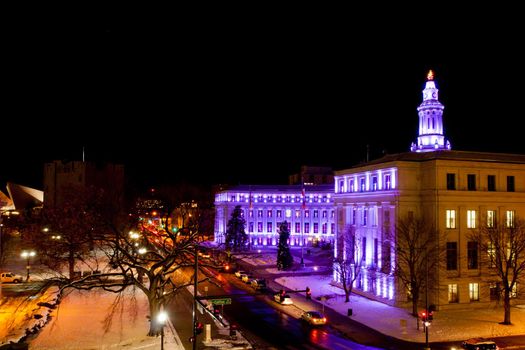 Downtown Denver at Christmas. Denver's City and County building decorated with holiday lights.