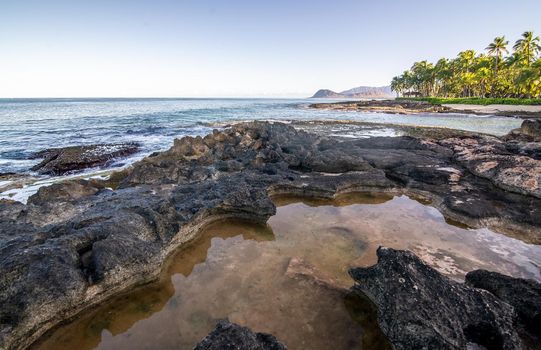 beautiful blue sky and beach scenes on secret beach oahu hwaii