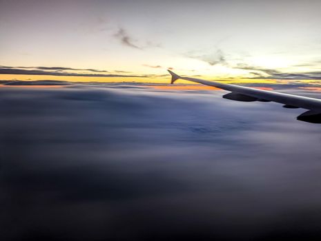 early morning sunrise from an airplane