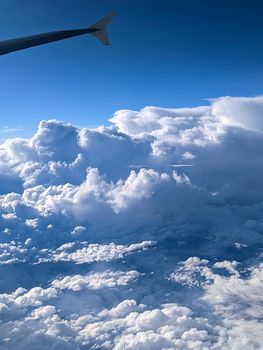 flying high in the sky with beautiful clouds