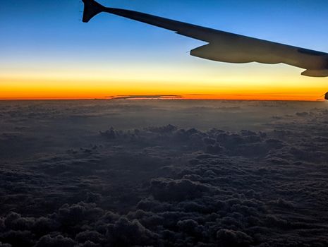 early morning sunrise from an airplane