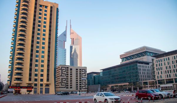 Dubai Financial Center road. Landmarks such Jumeirah Emirates towers, DIFC on the picture. Outdoors