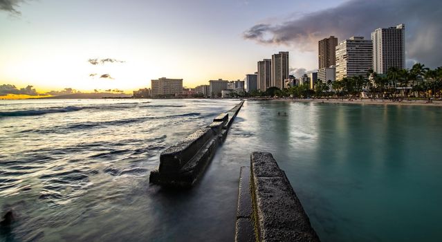 sunset at waikiki beach area in oahu hawaii