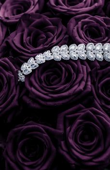 Luxe branding, glamour fashion and boutique shopping concept - Luxury diamond jewelry bracelet and purple roses flowers, love gift on Valentines Day and jewellery brand holiday background design