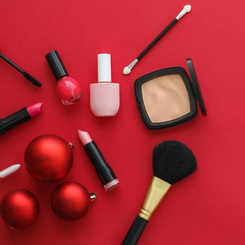 Cosmetic branding, fashion blog cover and girly glamour concept - Make-up and cosmetics product set for beauty brand Christmas sale promotion, luxury red flatlay background as holiday design